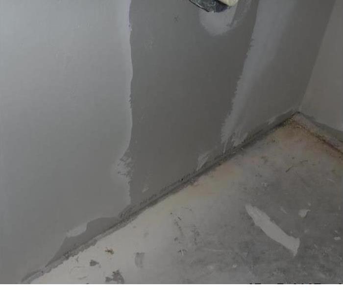 drywall and tile floor